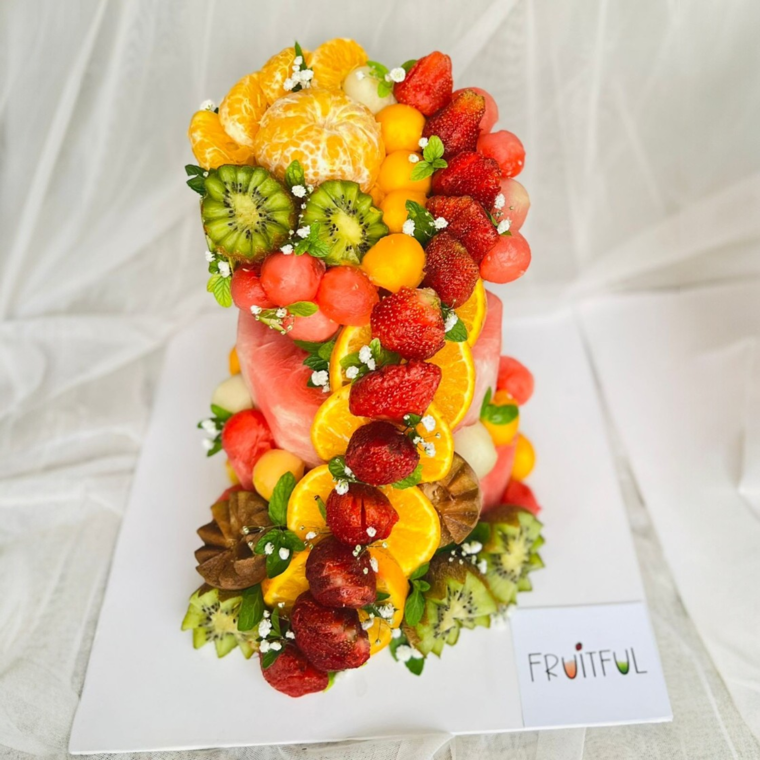 Two Tier Fruit Cake in Watermelon Base